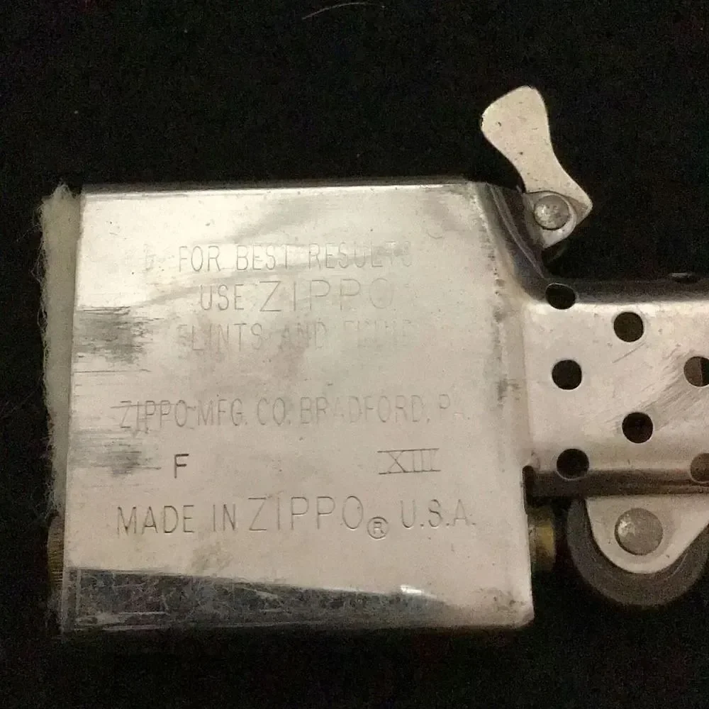 Zippo F-Xllll candle striker needs flint